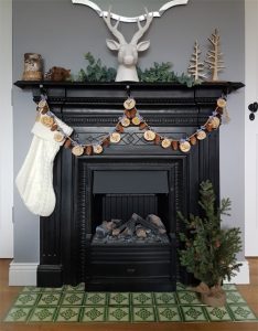a photo of a garland fireplace