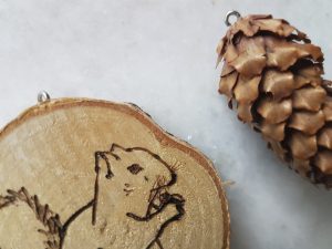 a picture of pyrography pen art on wood